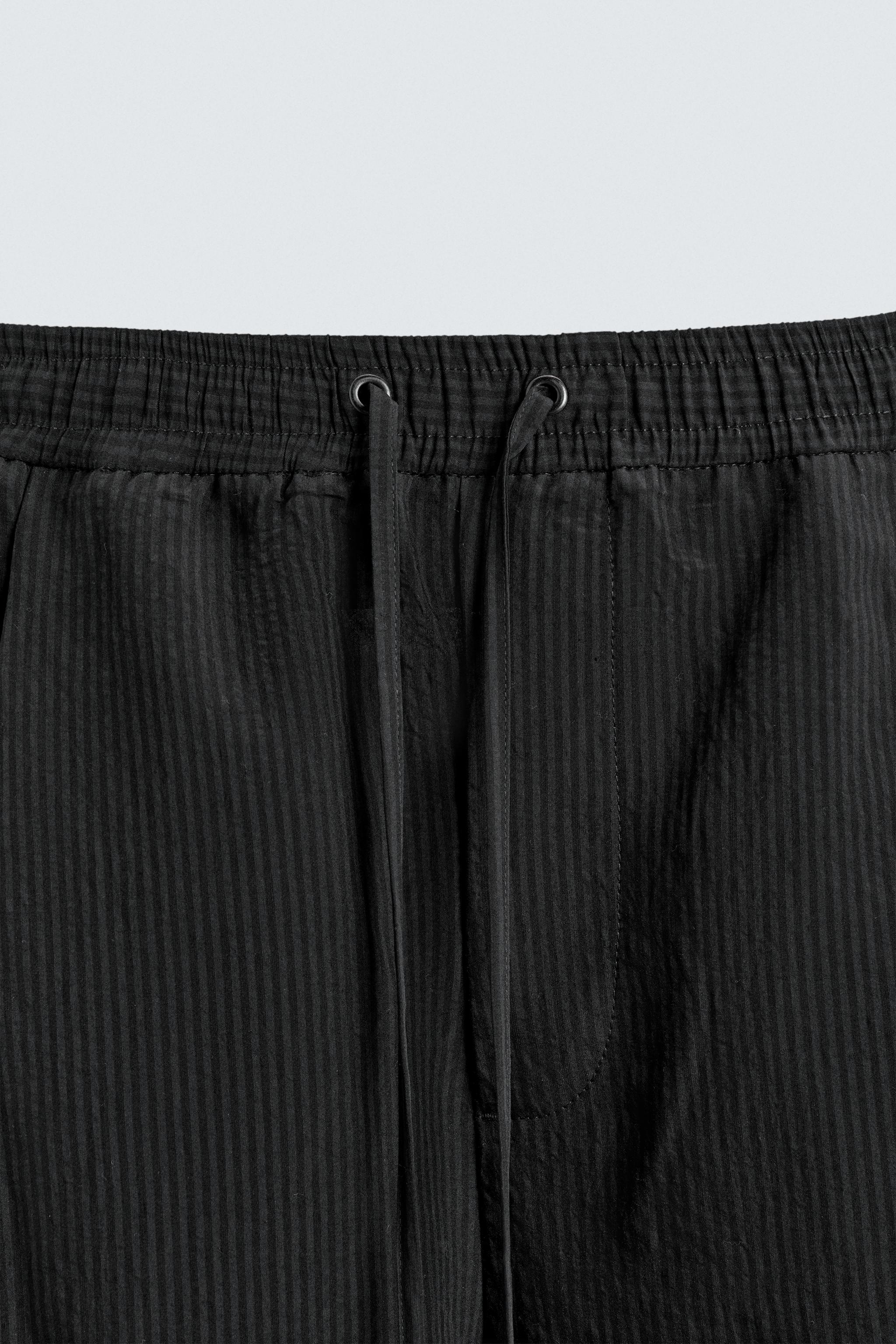 SHORT FLUIDE JACQUARD À RAYURES
